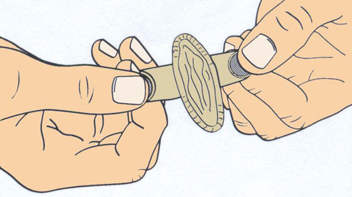 One experimental condom has tabs on either side so it's easier to put on in the dark. One experimental condom has tabs on either side so it's easier to put on in the dark.
