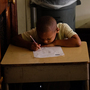 Third-grader Kassim West last July at Walter G. Smith Elementary School, one of more than 20 Philadelphia public schools that closed at the end of the school year. Third-grader Kassim West last July at Walter G. Smith Elementary School, one of more than 20 Philadelphia public schools that closed at the end of the school year.