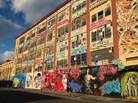 The walls of 5Pointz were once covered in graffiti. Artists worldwide came to New York to paint the warehouse surface. The walls of 5Pointz were once covered in graffiti. Artists worldwide came to New York to paint the warehouse surface.