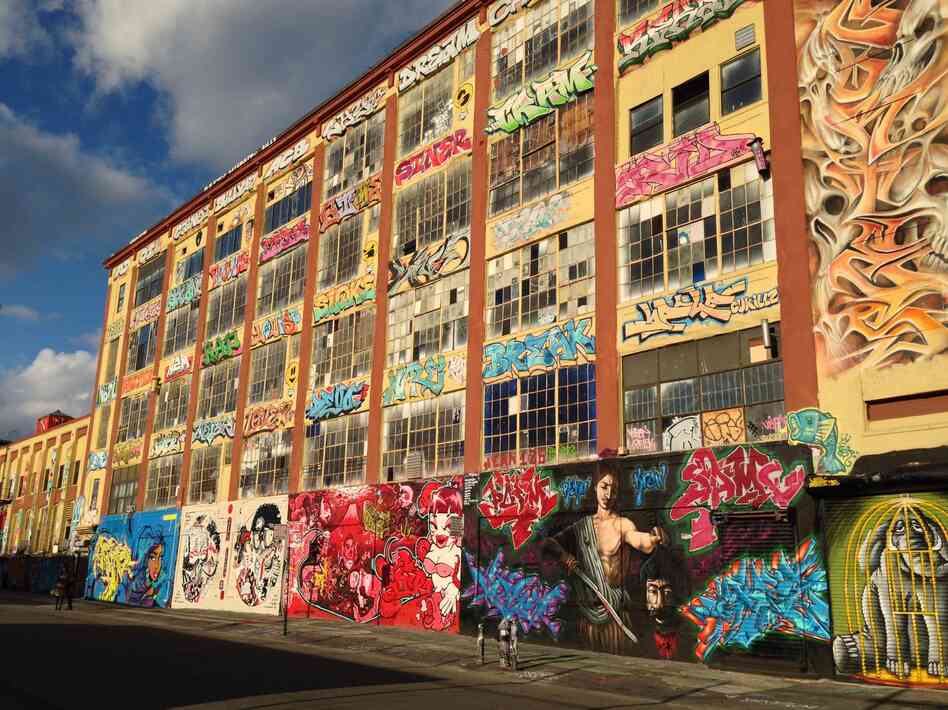 The walls of 5Pointz were once covered in graffiti. Artists worldwide came to New York to paint the warehouse surface. The walls of 5Pointz were once covered in graffiti. Artists worldwide came to New York to paint the warehouse surface.