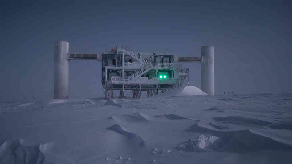The average temperature in winter is about -72 degrees Faharenheit. The IceCube Lab is illuminated in the moonlight. The average temperature in winter is about -72 degrees Faharenheit. The IceCube Lab is illuminated in the moonlight.