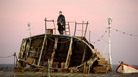 A singer takes the stage during the first performance of "Grimes on the Beach," an outdoor production of Benjamin Britten's opera Peter Grimes, on June 17, 2013 in Aldeburgh, England. A singer takes the stage during the first performance of "Grimes on the Beach," an outdoor production of Benjamin Britten's opera Peter Grimes, on June 17, 2013 in Aldeburgh, England.