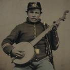 An unidentified Union soldier holds a banjo. An unidentified Union soldier holds a banjo.