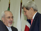 Secretary of State John Kerry and Iranian Foreign Minister Mohammad Javad Zarif shake hands Sunday at the United Nations Palais in Geneva. Secretary of State John Kerry and Iranian Foreign Minister Mohammad Javad Zarif shake hands Sunday at the United Nations Palais in Geneva.