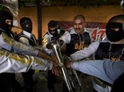 Edgar Quintero of the band Los Bukanas de Culiacan likens what he does in the narcocorrido genre to gangster rap. Edgar Quintero of the band Los Bukanas de Culiacan likens what he does in the narcocorrido genre to gangster rap.