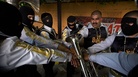 Edgar Quintero of the band Los Bukanas de Culiacan likens what he does in the narcocorrido genre to gangster rap. Edgar Quintero of the band Los Bukanas de Culiacan likens what he does in the narcocorrido genre to gangster rap.