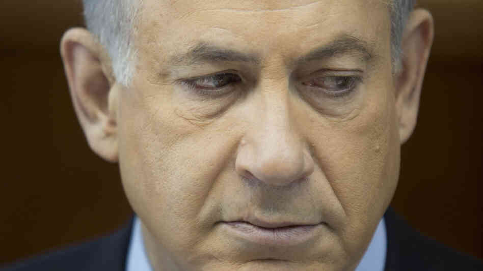 Israeli Prime Minister Benjamin Netanyahu attends the weekly Cabinet meeting at his office Sunday in Jerusalem. Netanyahu says world powers gave away too much for too little in the interim deal reached last weekend with Iran over its nuclear program. Israeli Prime Minister Benjamin Netanyahu attends the weekly Cabinet meeting at his office Sunday in Jerusalem. Netanyahu says world powers gave away too much for too little in the interim deal reached last weekend with Iran over its nuclear program.