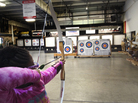 Y'Jazzmin Christopher, 7, takes up target practice at Archery in the Wild in Longmont, Colo. "She used to be a really shy person, but now she's opening socially," says Alicia Christopher, Y'Jazzmin's mom, about her daughter's archery. Y'Jazzmin Christopher, 7, takes up target practice at Archery in the Wild in Longmont, Colo. "She used to be a really shy person, but now she's opening socially," says Alicia Christopher, Y'Jazzmin's mom, about her daughter's archery.