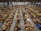 A worker at the Amazon fulfillment center in Swansea, Wales, processes orders in 2011. A worker at the Amazon fulfillment center in Swansea, Wales, processes orders in 2011.