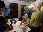 Health and Human Services Secretary Kathleen Sebelius visits navigators helping enroll people on HealthCare.gov. Health and Human Services Secretary Kathleen Sebelius visits navigators helping enroll people on HealthCare.gov.