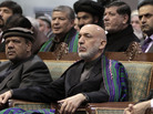 Afghan President Hamid Karzai attends the Loya Jirga, or grand assembly, in Kabul on Sunday. The assembly approved a deal that would allow the U.S. to keep troops in Afghanistan beyond 2014. But Karzai has not yet agreed to sign the deal. Afghan President Hamid Karzai attends the Loya Jirga, or grand assembly, in Kabul on Sunday. The assembly approved a deal that would allow the U.S. to keep troops in Afghanistan beyond 2014. But Karzai has not yet agreed to sign the deal.