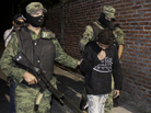 A 2010 file photo shows Edgar "El Ponchis" Jimenez Lugo in the city of Cuernavaca, Mexico. The teenage U.S. citizen who acknowledged being a drug-cartel killer has finished his three year juvenile-offender term for homicide, kidnapping and drug and weapons possession. A 2010 file photo shows Edgar "El Ponchis" Jimenez Lugo in the city of Cuernavaca, Mexico. The teenage U.S. citizen who acknowledged being a drug-cartel killer has finished his three year juvenile-offender term for homicide, kidnapping and drug and weapons possession.