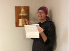 Barbara King rings the "victory bell" and holds up a certificate celebrating her completion of 25 external radiation treatments. Barbara King rings the "victory bell" and holds up a certificate celebrating her completion of 25 external radiation treatments.