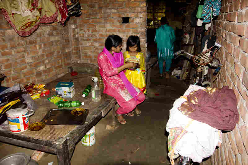 Shumi and Minu say when they grew up in the village there wasn't enough food to eat. They had three younger sisters who all died before they were 7.