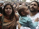 Alaa Abdel-Fattah, seen with his wife and child in March, was arrested from his home Thursday. Alaa Abdel-Fattah, seen with his wife and child in March, was arrested from his home Thursday.