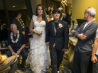 Saralyn Morales (center left) and Isajah Morales walk down the aisle at the Sheraton Waikiki in Honolulu shortly after Hawaii's new gay marriage law took effect Monday. Saralyn Morales (center left) and Isajah Morales walk down the aisle at the Sheraton Waikiki in Honolulu shortly after Hawaii's new gay marriage law took effect Monday.