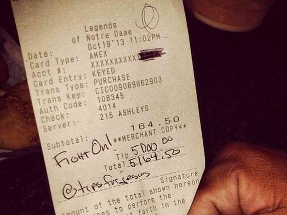 One of the two checks that "TipsForJesus" signed at a restaurant in South Bend, Ind., on Oct. 19. The anonymous givers added $5,000 to each of the bills. One of the two checks that "TipsForJesus" signed at a restaurant in South Bend, Ind., on Oct. 19. The anonymous givers added $5,000 to each of the bills.