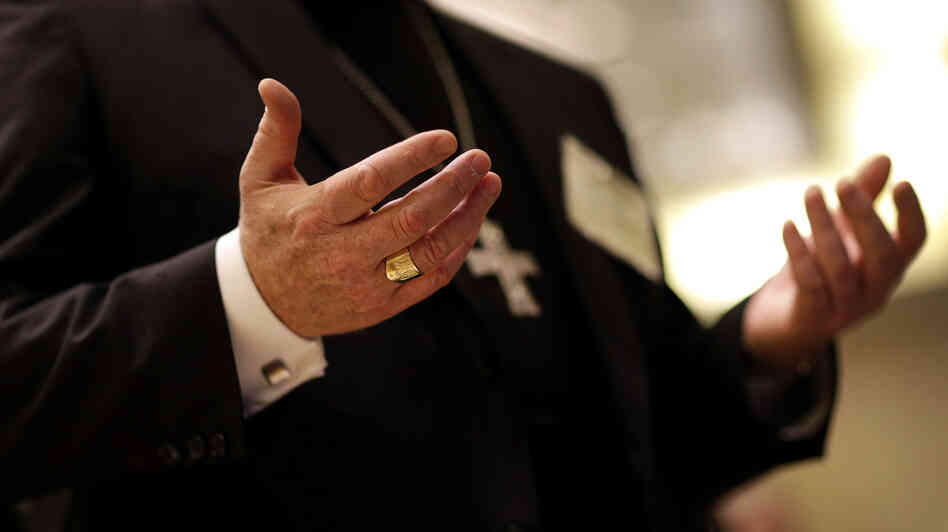 Archbishop Joseph William Tobin of Indianapolis prays at the United States Conference of Catholic Bishops' annual fall meeting in Baltimore on Nov. 12. Archbishop Joseph William Tobin of Indianapolis prays at the United States Conference of Catholic Bishops' annual fall meeting in Baltimore on Nov. 12.