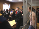Pavel Dmitrichenko, a former leading dancer in Russia's Bolshoi ballet, stands inside the defendant's cage in a Moscow court Tuesday. He was sentenced to six years in prison for ordering an acid attack on the Bolshoi's artistic director, Sergei Filin. Pavel Dmitrichenko, a former leading dancer in Russia's Bolshoi ballet, stands inside the defendant's cage in a Moscow court Tuesday. He was sentenced to six years in prison for ordering an acid attack on the Bolshoi's artistic director, Sergei Filin.