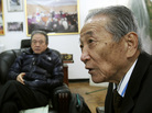 Park Boo Seo (right), a former member of the Korean Kuwol partisan unit, speaks about Merrill Newman, an American tourist detained in North Korea. Newman supervised the group during the Korean War. Park Boo Seo (right), a former member of the Korean Kuwol partisan unit, speaks about Merrill Newman, an American tourist detained in North Korea. Newman supervised the group during the Korean War.