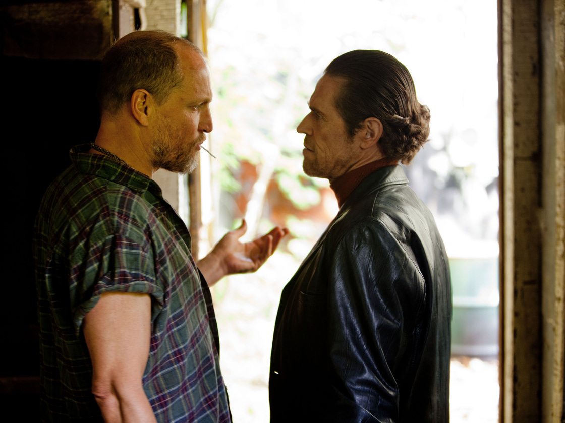 Rodney gets mixed up with the wrong kind of people while Russell is in prison, including a loan shark (Willem Dafoe, right), and a psychotic bookie (Woody Harrelson, left).
