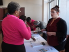 Enroll America outreach workers talk to congregants at the Mt. Calvary Church in Jacksonville, Fla. Enroll America outreach workers talk to congregants at the Mt. Calvary Church in Jacksonville, Fla.
