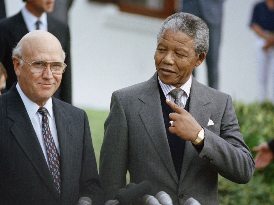 Nelson Mandela with South African President F.W. de Klerk in May 1990. Mandela died Thursday at 95.