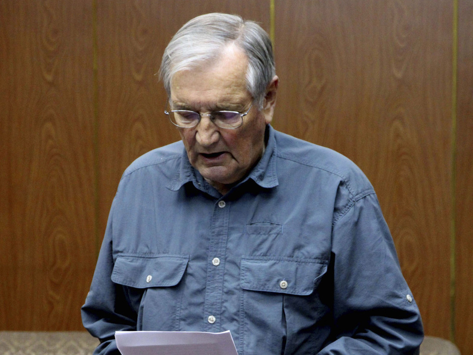 A Nov. 9, 2013 file photo released by KCNA of U.S. citizen Merrill Newman reportedly reading an apology.