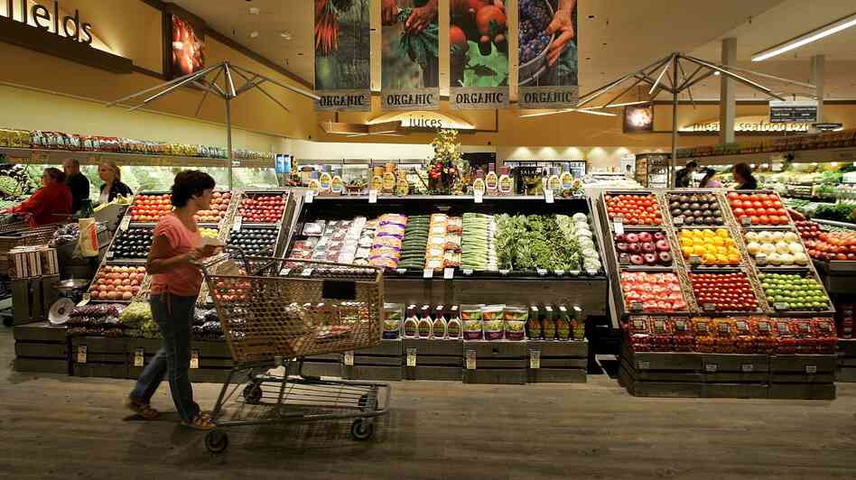 A Safeway customer browses in the fruit and vegetable section at Safeway in Livermore, Calif. A Safeway customer browses in the fruit and vegetable section at Safeway in Livermore, Calif.