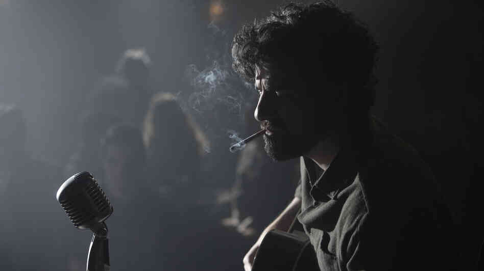 In the Coen brothers' latest film, down and out Llewyn Davis (Oscar Isaac) is trying to make ends meet as a folk singer in New York in the early 1960s. In the Coen brothers' latest film, down and out Llewyn Davis (Oscar Isaac) is trying to make ends meet as a folk singer in New York in the early 1960s.