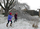Enari Hernandez, left, 6, and her cousin Maritza Jimenez, 6, play in front of a damaged tree in their neighbors yard on Saturday in Plano, Texas. Enari Hernandez, left, 6, and her cousin Maritza Jimenez, 6, play in front of a damaged tree in their neighbors yard on Saturday in Plano, Texas.