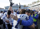 Duke coach David Cutcliffe hugs linebacker David Helton following Duke's 27-25 win over North Carolina on Nov. 30. Duke coach David Cutcliffe hugs linebacker David Helton following Duke's 27-25 win over North Carolina on Nov. 30.