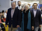Merrill Newman (left) walks beside his wife Lee and son Jeffrey after arriving at San Francisco International Airport on Saturday. Merrill Newman (left) walks beside his wife Lee and son Jeffrey after arriving at San Francisco International Airport on Saturday.