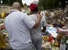 A sea of tributes grows outside the home of former President Nelson Mandela in Johannesburg, South Africa, on Sunday. A sea of tributes grows outside the home of former President Nelson Mandela in Johannesburg, South Africa, on Sunday.