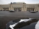 Cars pass by the RIA Novosti information agency headquarters in Moscow on Monday. President Vladimir Putin named Dmitry Kiselyov, a controversial news anchor known for his ultraconservative views, to head a newly restructured state news agency. Cars pass by the RIA Novosti information agency headquarters in Moscow on Monday. President Vladimir Putin named Dmitry Kiselyov, a controversial news anchor known for his ultraconservative views, to head a newly restructured state news agency.