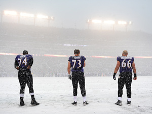A winter storm is hitting an area from Virginia to New England, snarling traffic and closing schools. On Sunday, heavy snowfall changed the look of an NFL game in Baltimore, Md., where Ravens players stood for the national anthem at 1 p.m. A winter storm is hitting an area from Virginia to New England, snarling traffic and closing schools. On Sunday, heavy snowfall changed the look of an NFL game in Baltimore, Md., where Ravens players stood for the national anthem at 1 p.m.