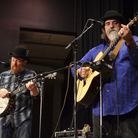 Tim O'Brien (left) and Darrell Scott perform live on Mountain Stage. Tim O'Brien (left) and Darrell Scott perform live on Mountain Stage.