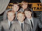 The Beach Boys in 1964. Top row: Carl Wilson, Dennis Wilson. Bottom row: Mike Love, Al Jardine, Brian Wilson.