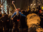Anti-government protesters use a sledge hammer to destroy a statue of Russian communist revolutionary leader Vladimir Lenin on Sunday in Kiev. Anti-government protesters use a sledge hammer to destroy a statue of Russian communist revolutionary leader Vladimir Lenin on Sunday in Kiev.