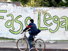 A bicycle passes graffiti that reads in Spanish, "Legal pot," in Montevideo, Uruguay, in November 2012. A bicycle passes graffiti that reads in Spanish, "Legal pot," in Montevideo, Uruguay, in November 2012.