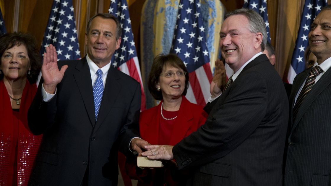 Rep. Steve Stockman, R-Texas, second from right, participates in a mock swearing-in ceremony with House Speaker John Boehner on Jan. 3. Stockman made the surprise move Monday to challenge Sen. John Cornyn in the 2014 Texas GOP primary.