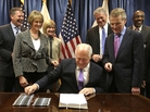 Illinois Gov. Pat Quinn smiles during the signing of the pension overhaul legislation bill on Dec. 5 in Chicago. Looking on from left are Sen. Bill Brady, R-Bloomington; Senate GOP leader Sen. Christine Radogno; Rep. Darlene Senger, R-Naperville; Rep. Jim Durkin, R-Western Springs; House Speaker Michael Madigan and Sen. Kwame Raoul, D-Chicago. Illinois Gov. Pat Quinn smiles during the signing of the pension overhaul legislation bill on Dec. 5 in Chicago. Looking on from left are Sen. Bill Brady, R-Bloomington; Senate GOP leader Sen. Christine Radogno; Rep. Darlene Senger, R-Naperville; Rep. Jim Durkin, R-Western Springs; House Speaker Michael Madigan and Sen. Kwame Raoul, D-Chicago.