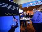A prospective job seeker gets information at a job resource fair for military veterans in Van Nuys, Calif., on Oct. 24. A prospective job seeker gets information at a job resource fair for military veterans in Van Nuys, Calif., on Oct. 24.