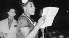 Ella Fitzgerald sings with bandleader Chick Webb in Asbury Park, N.J., in 1938. Ella Fitzgerald sings with bandleader Chick Webb in Asbury Park, N.J., in 1938.