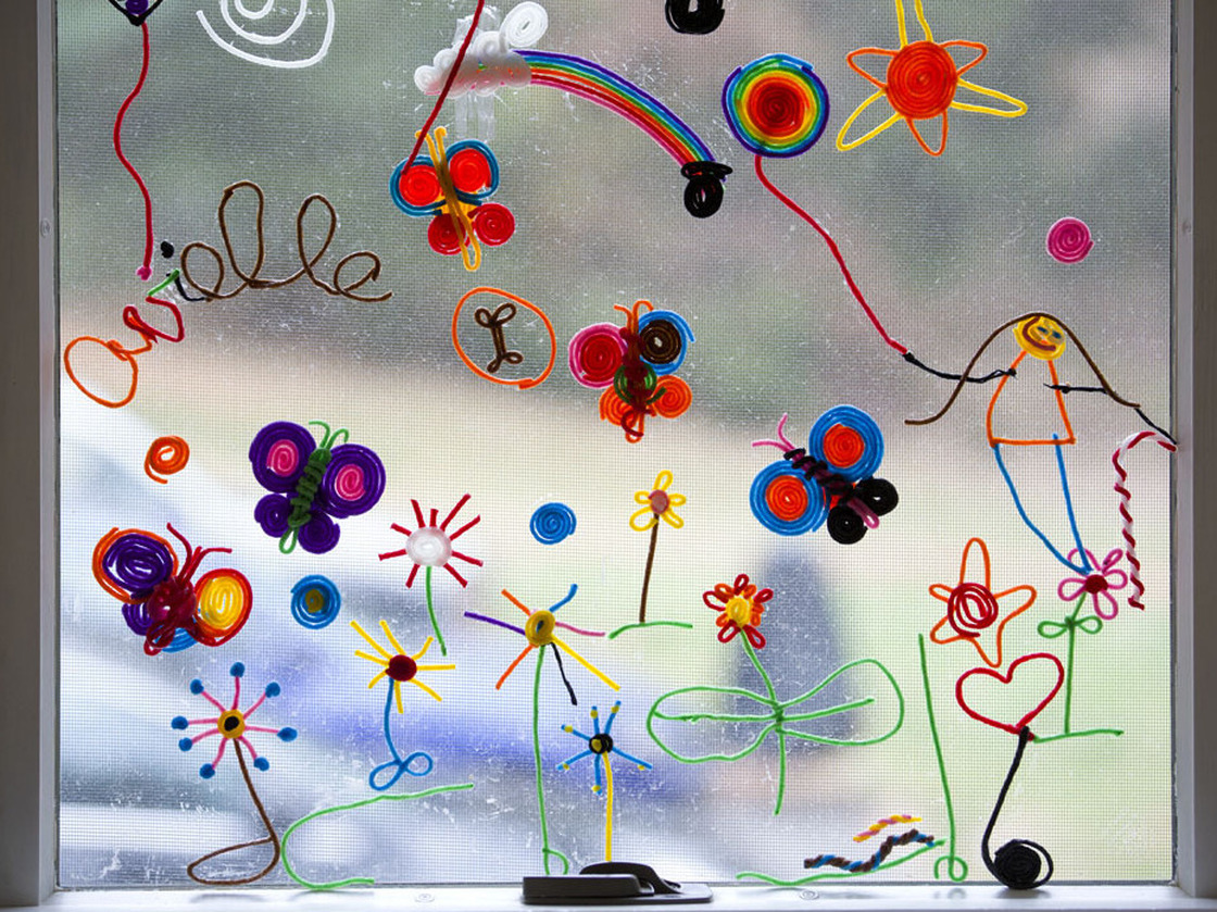 Avielle's artwork hangs on the walls and windows of Jeremy Richman and Jennifer Hensel's home. Avielle's artwork hangs on the walls and windows of Jeremy Richman and Jennifer Hensel's home.