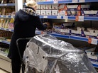 A customer scans the shelves at Community Shop, the U.K.'s first "social supermarket." The discount grocery stores are growing in popularity across Europe and are open exclusively to those in need. A customer scans the shelves at Community Shop, the U.K.'s first "social supermarket." The discount grocery stores are growing in popularity across Europe and are open exclusively to those in need.