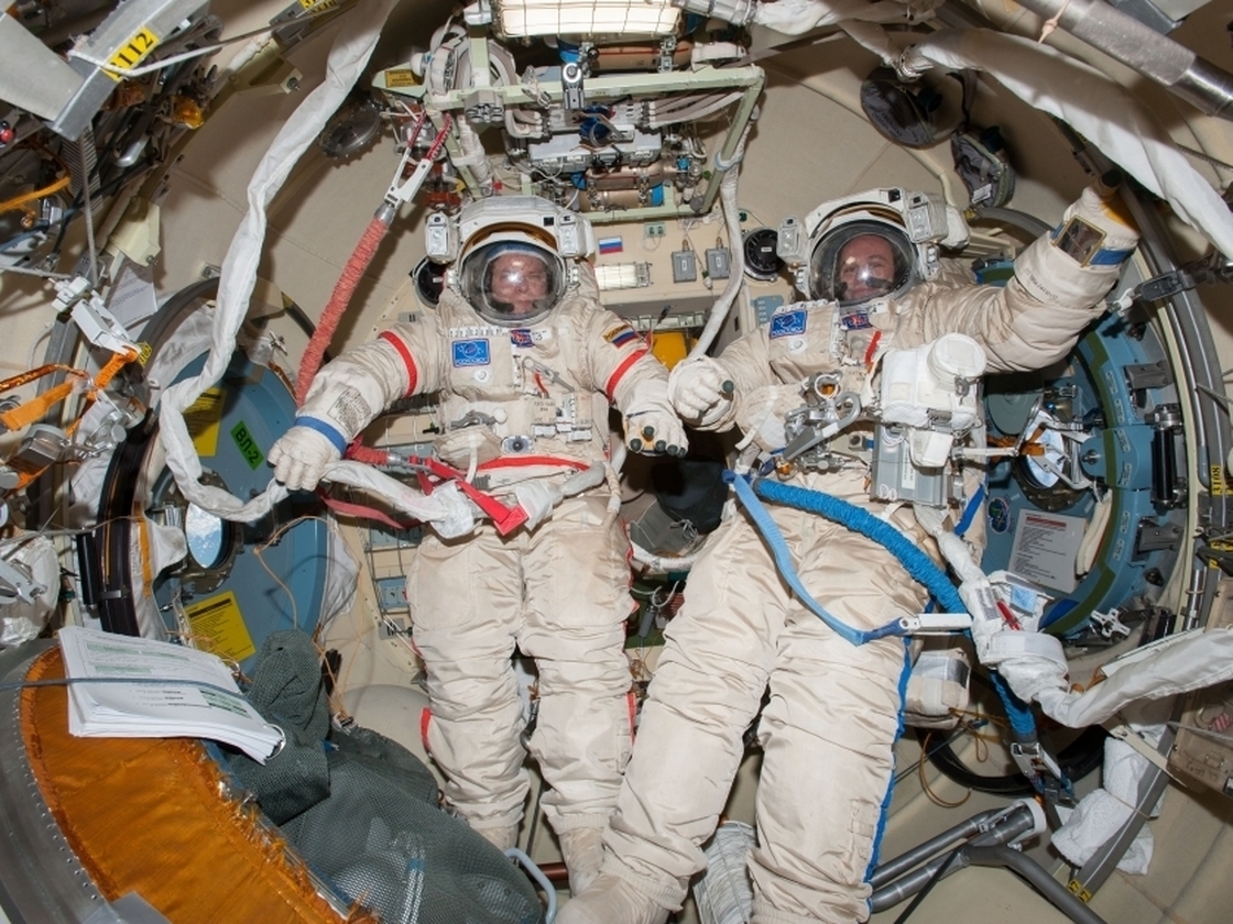Commander Oleg Kotov (left) and Sergey Ryanzansky, preparing for a spacewalk aboard the ISS on Nov. 9. Commander Oleg Kotov (left) and Sergey Ryanzansky, preparing for a spacewalk aboard the ISS on Nov. 9.