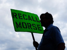 A man holds a sign advocating the recall of state Sen. John Morse in Colorado Springs, Colo., in September. Morse and a second state senator who backed the state's new gun-control measures were recalled during a special election that month. A man holds a sign advocating the recall of state Sen. John Morse in Colorado Springs, Colo., in September. Morse and a second state senator who backed the state's new gun-control measures were recalled during a special election that month.