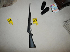 A crime scene photo provided by the Connecticut State Police shows a rifle in the master bedroom in Adam Lanza's house. A crime scene photo provided by the Connecticut State Police shows a rifle in the master bedroom in Adam Lanza's house.