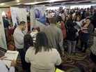 Job seekers attend at a career fair in Miami Lakes, Fla., in August. At the end of the year, 1.3 million Americans will lose their extended unemployment benefits. Job seekers attend at a career fair in Miami Lakes, Fla., in August. At the end of the year, 1.3 million Americans will lose their extended unemployment benefits.